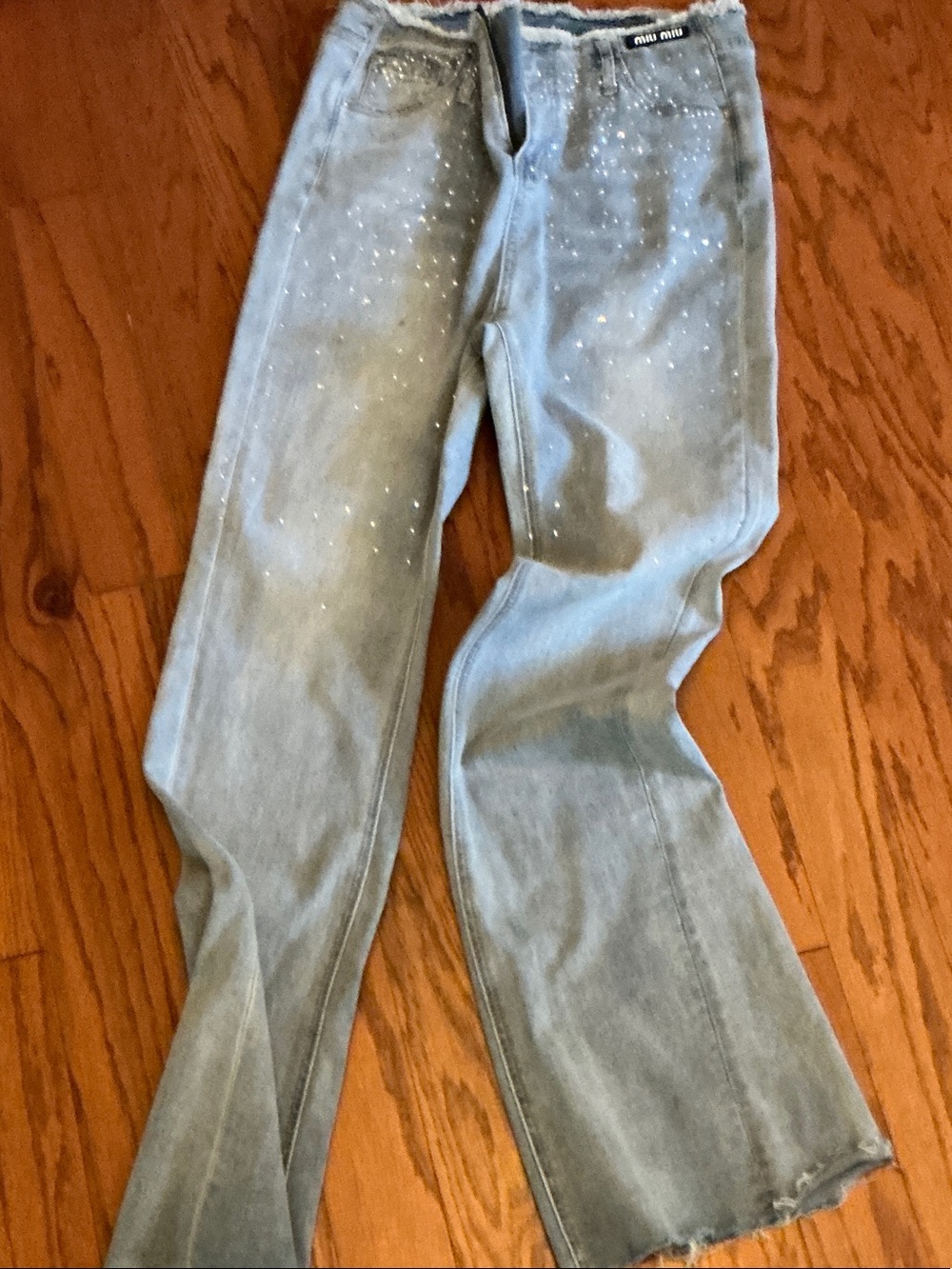 Miu Miu Light Blue Boot Cut Jeans with Subtle Silver Sparkle